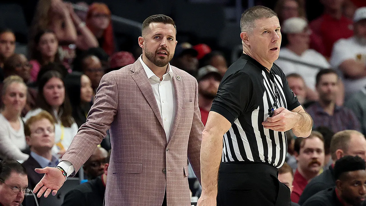 Florida State student manager Michael Rubin celebrating enthusiastically after successful challenge during basketball game