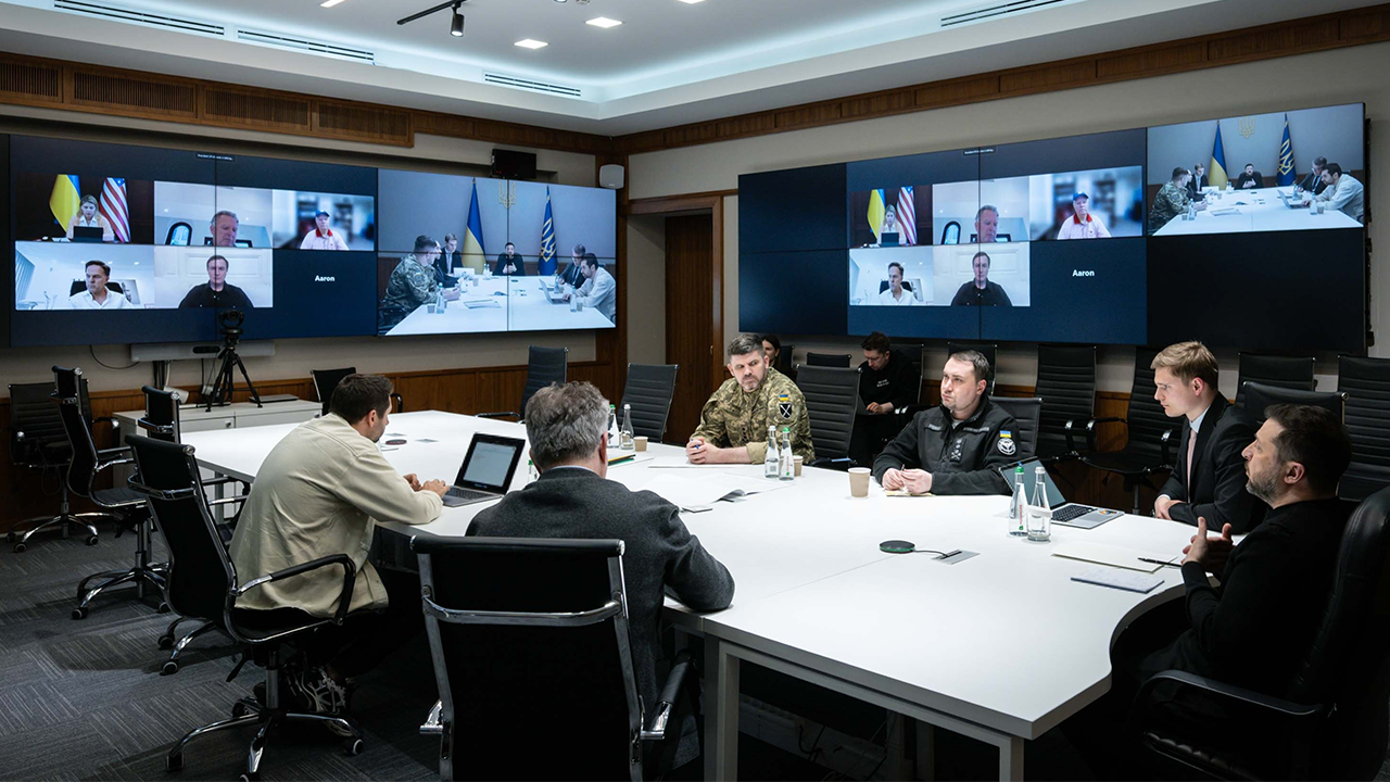 Ukrainian President Volodymyr Zelenskyy meeting with officials discussing diplomatic security agreements