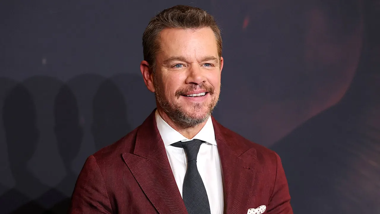 Actor Matt Damon smiling, longtime Boston Red Sox fan who flew home for 2004 World Series