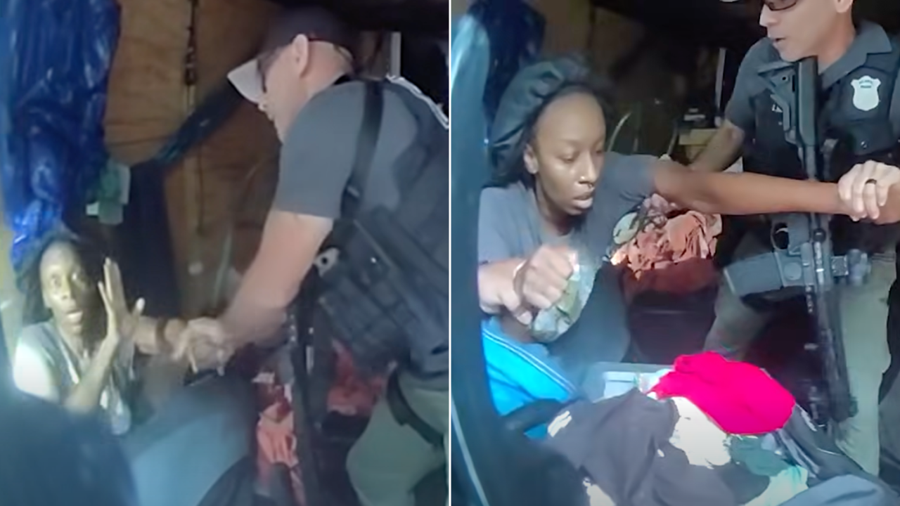 Atlanta police officers carrying rescued children from trailer to safety during Monday rescue operation