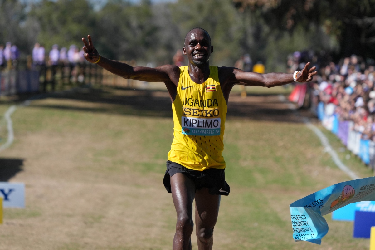 Jacob Kiplimo crossing finish line at Lisbon half-marathon in strong running form