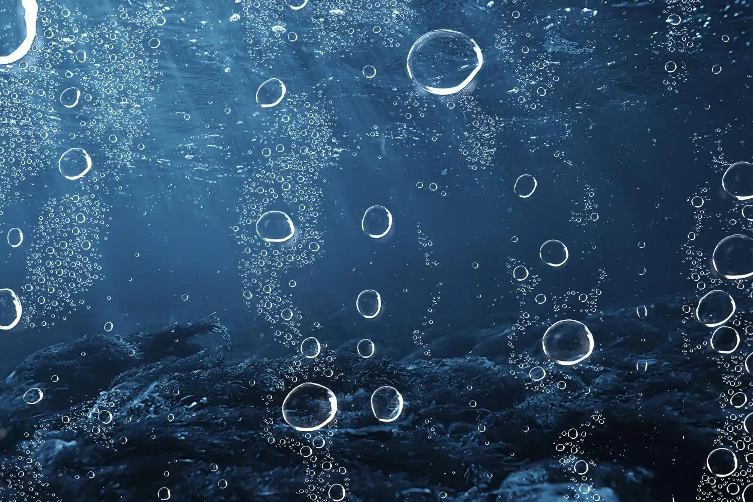 Microscopic phytoplankton algae floating in ocean water producing oxygen through photosynthesis