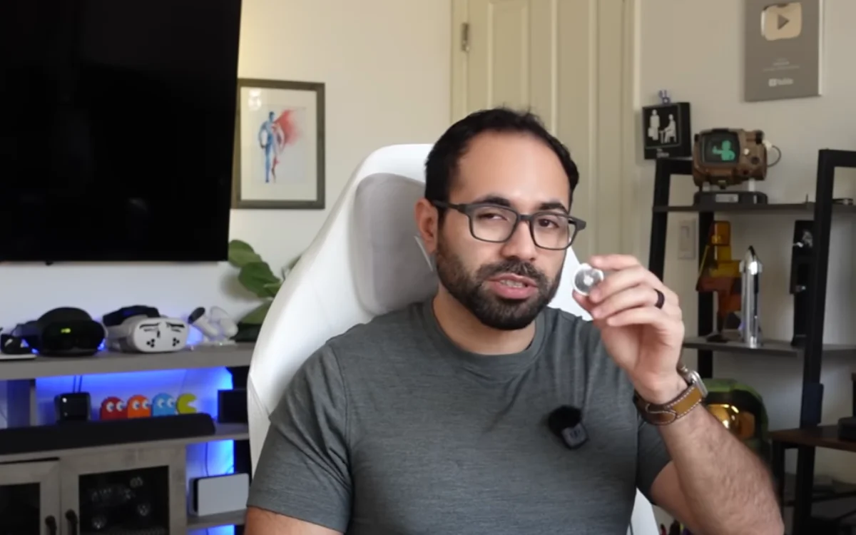 Person using Apple Watch to track lost items with AirTag precision finding feature