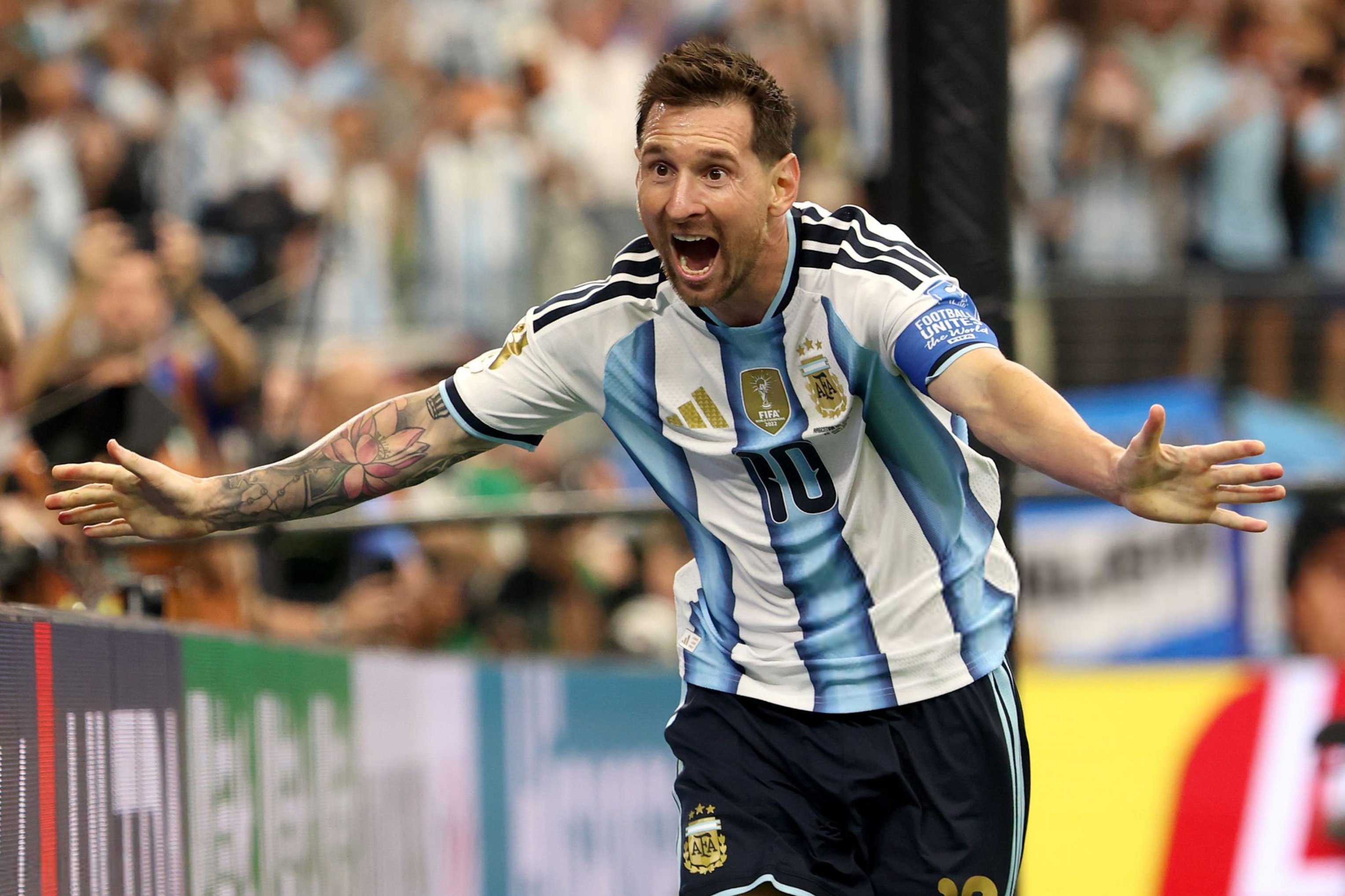 Lionel Messi celebrating in Argentina's blue and white striped jersey during 2026 World Cup