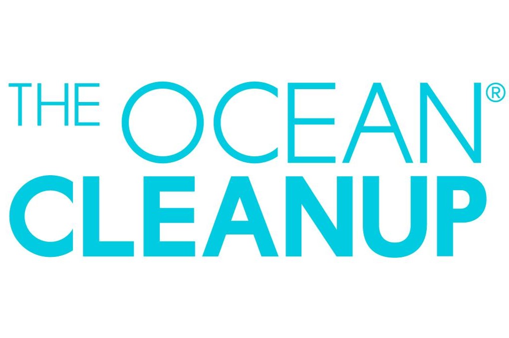 ** Drone aerial view of plastic waste flowing through Mumbai urban waterway toward ocean