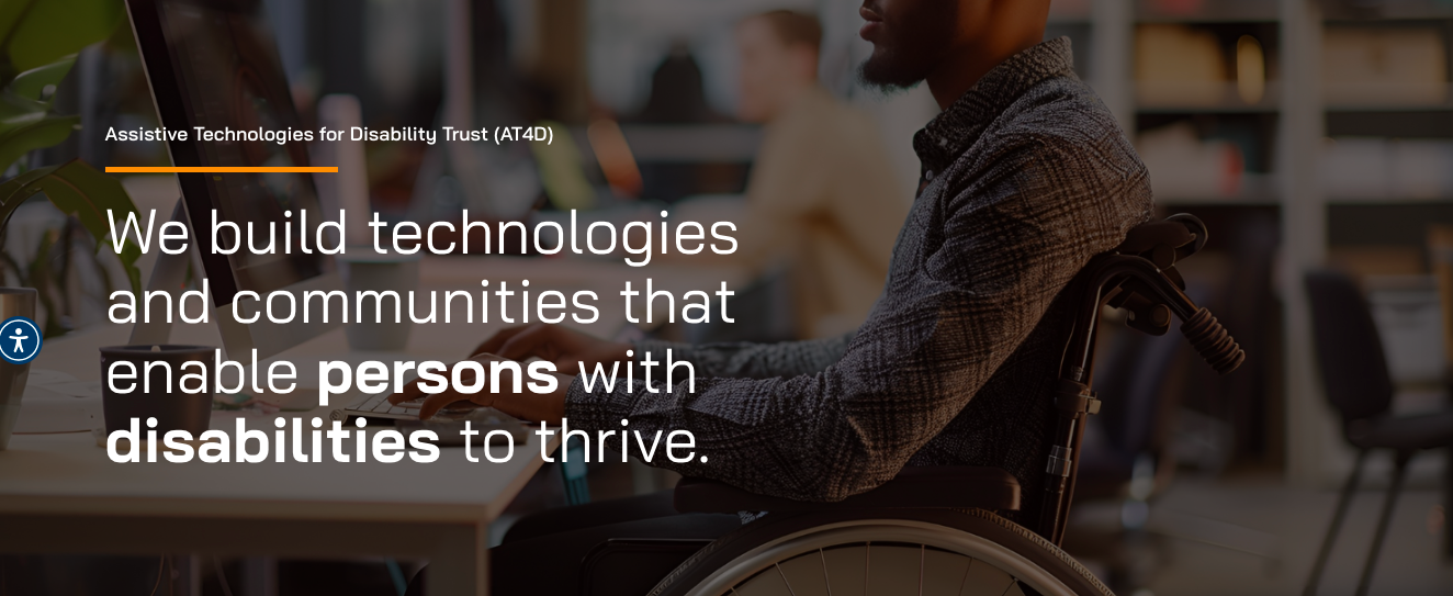 African entrepreneur working on assistive technology device in bright innovation lab space