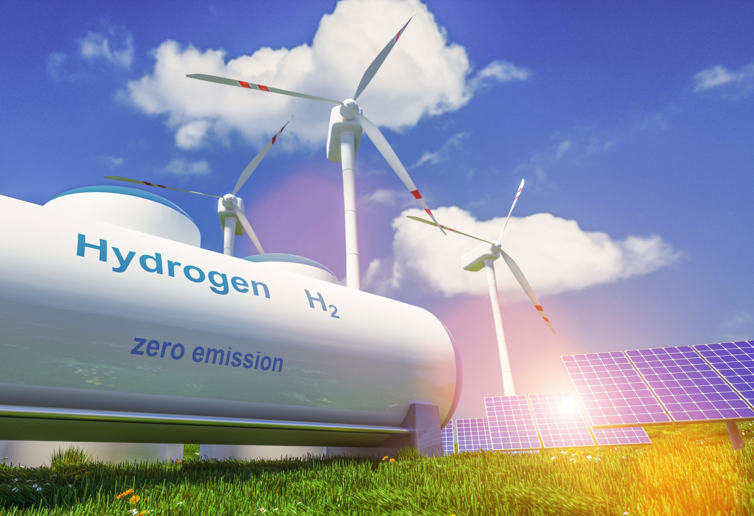 Wind turbines spinning against blue sky generating clean renewable electricity for Britain