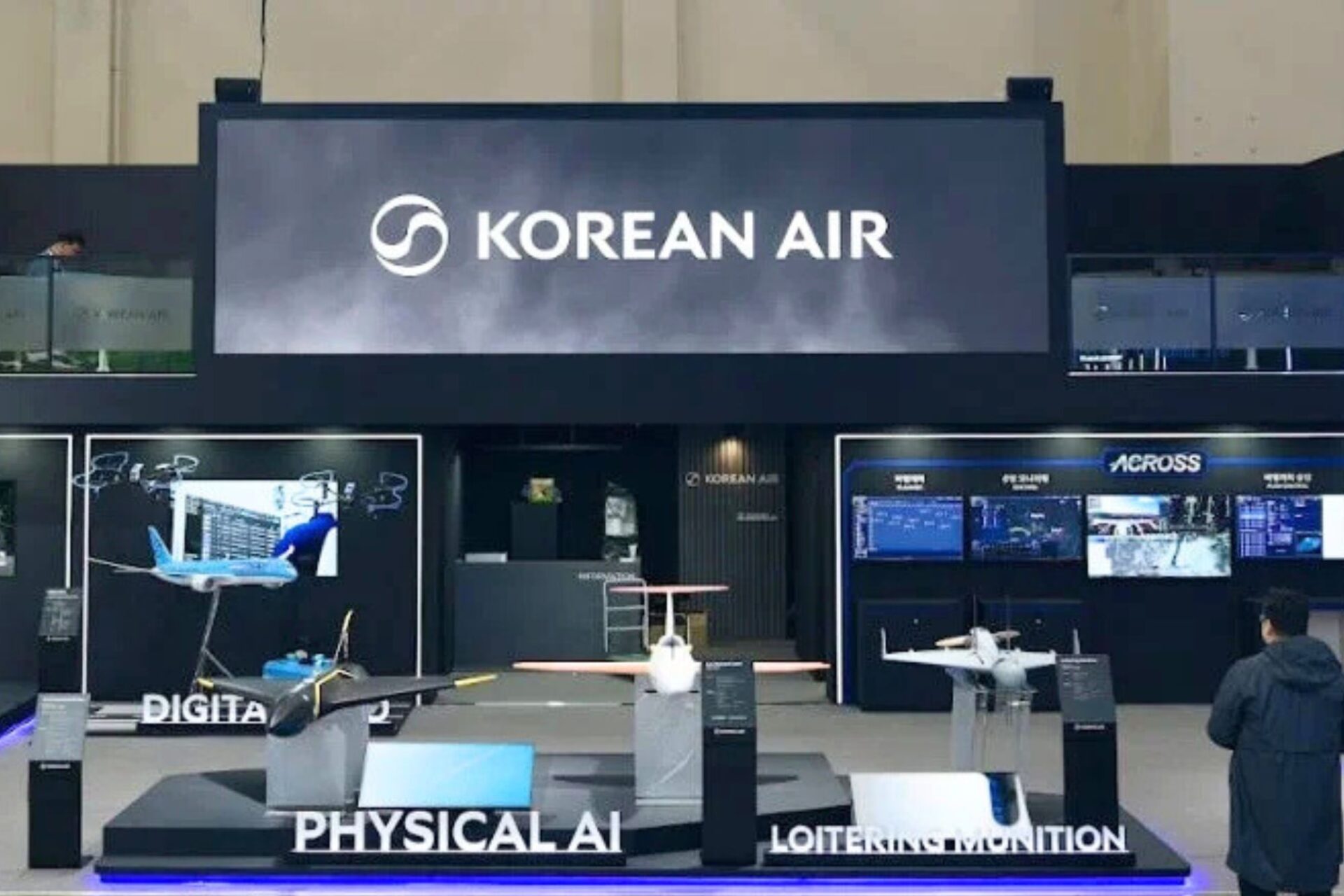 Korean Air display booth showcasing advanced AI-powered drones and electric aircraft technology at Busan exhibition