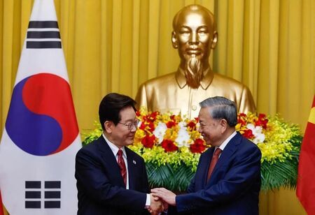 Vietnamese and South Korean flags side by side representing energy partnership collaboration