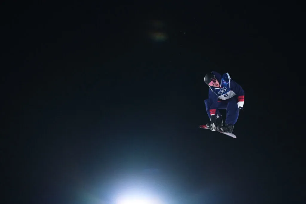 Seventeen-year-old snowboarder Ollie Martin competing in big air qualifications at 2026 Winter Olympics