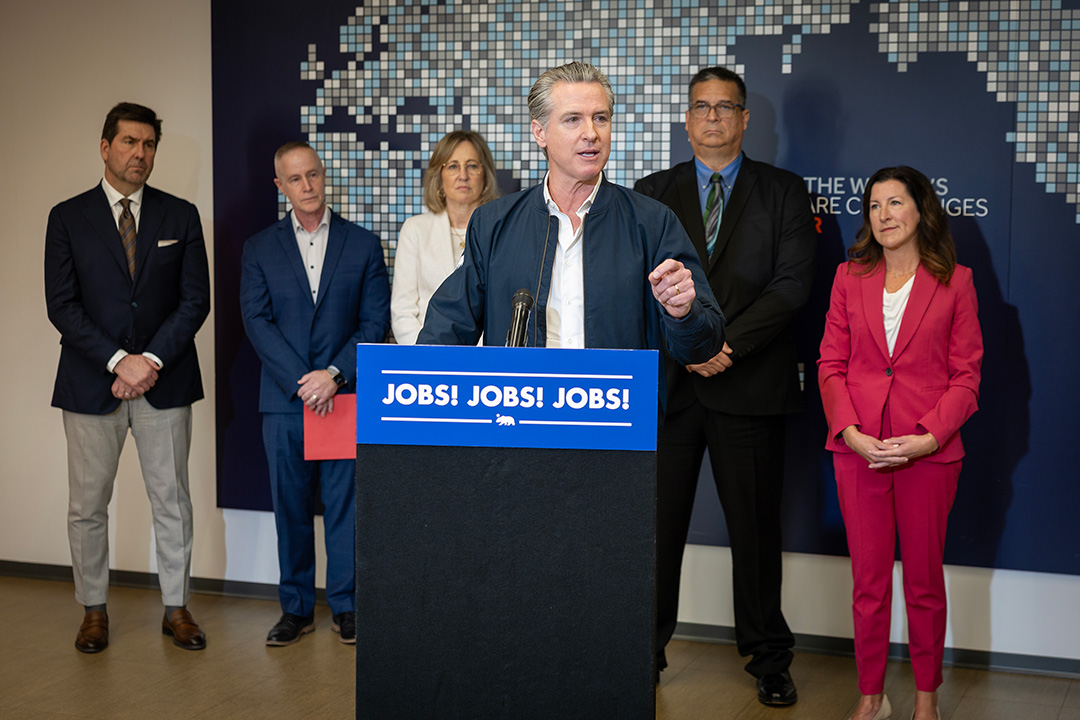 California workers training in modern facility representing statewide Jobs First economic development program
