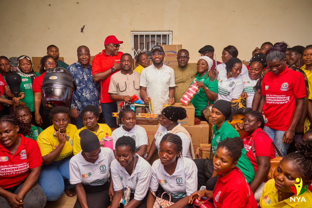 Young Ghanaian apprentices receiving toolboxes and equipment at Cape Coast graduation ceremony