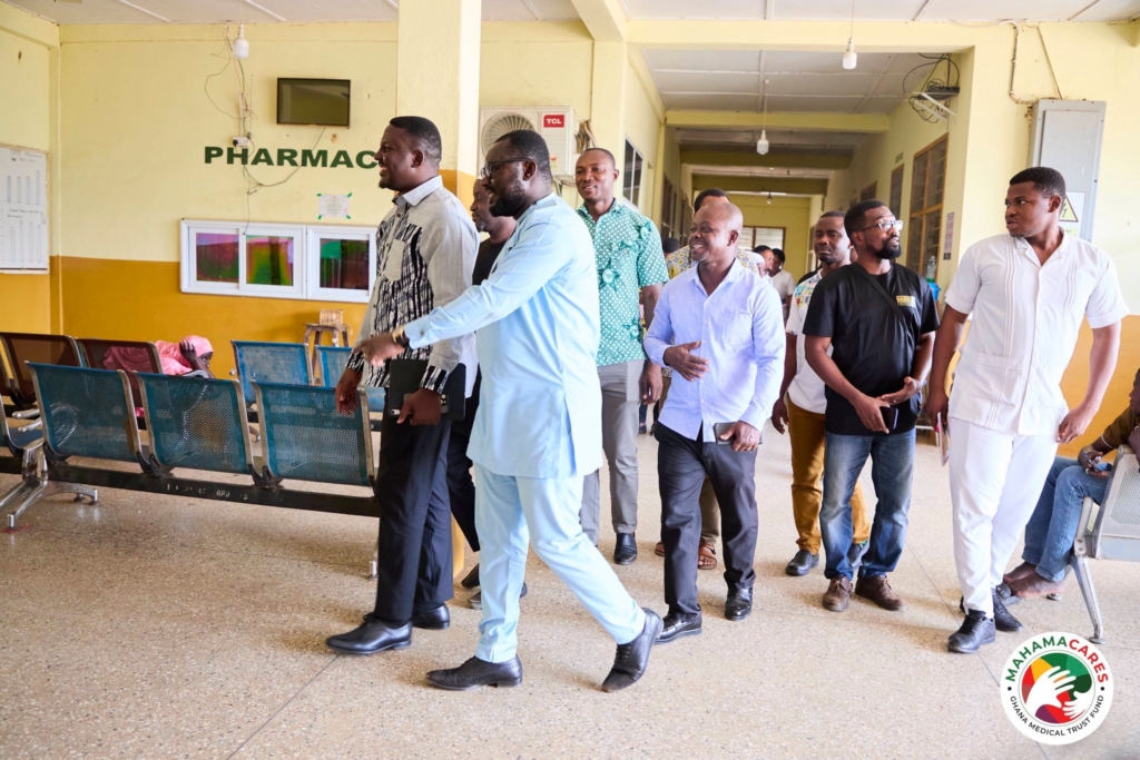 Healthcare workers standing outside Bole Municipal Hospital in Ghana's Savannah Region
