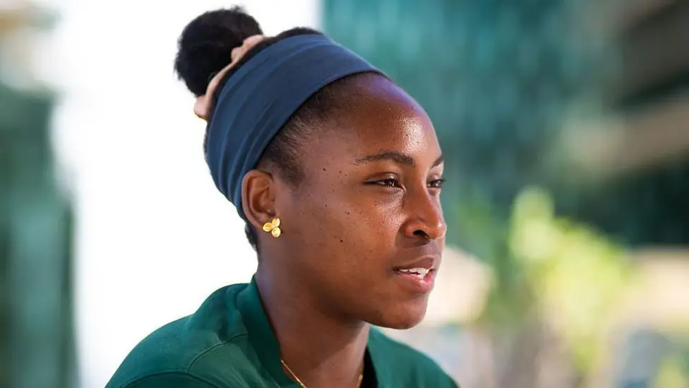 Coco Gauff celebrating on clay court at Madrid Open tennis tournament