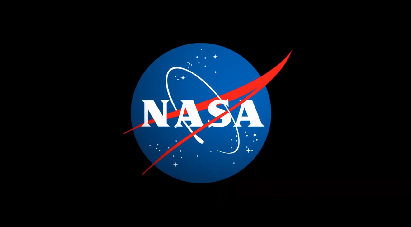 International Space Station orbiting Earth with solar panels extended against blue planet backdrop