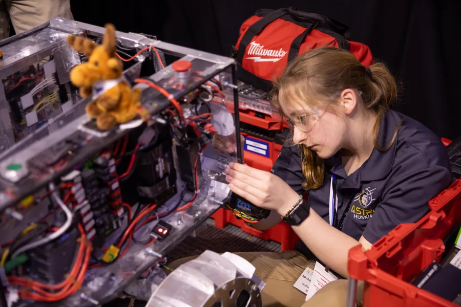 Student prepares lunar construction robot for competition at Kennedy Space Center in Florida