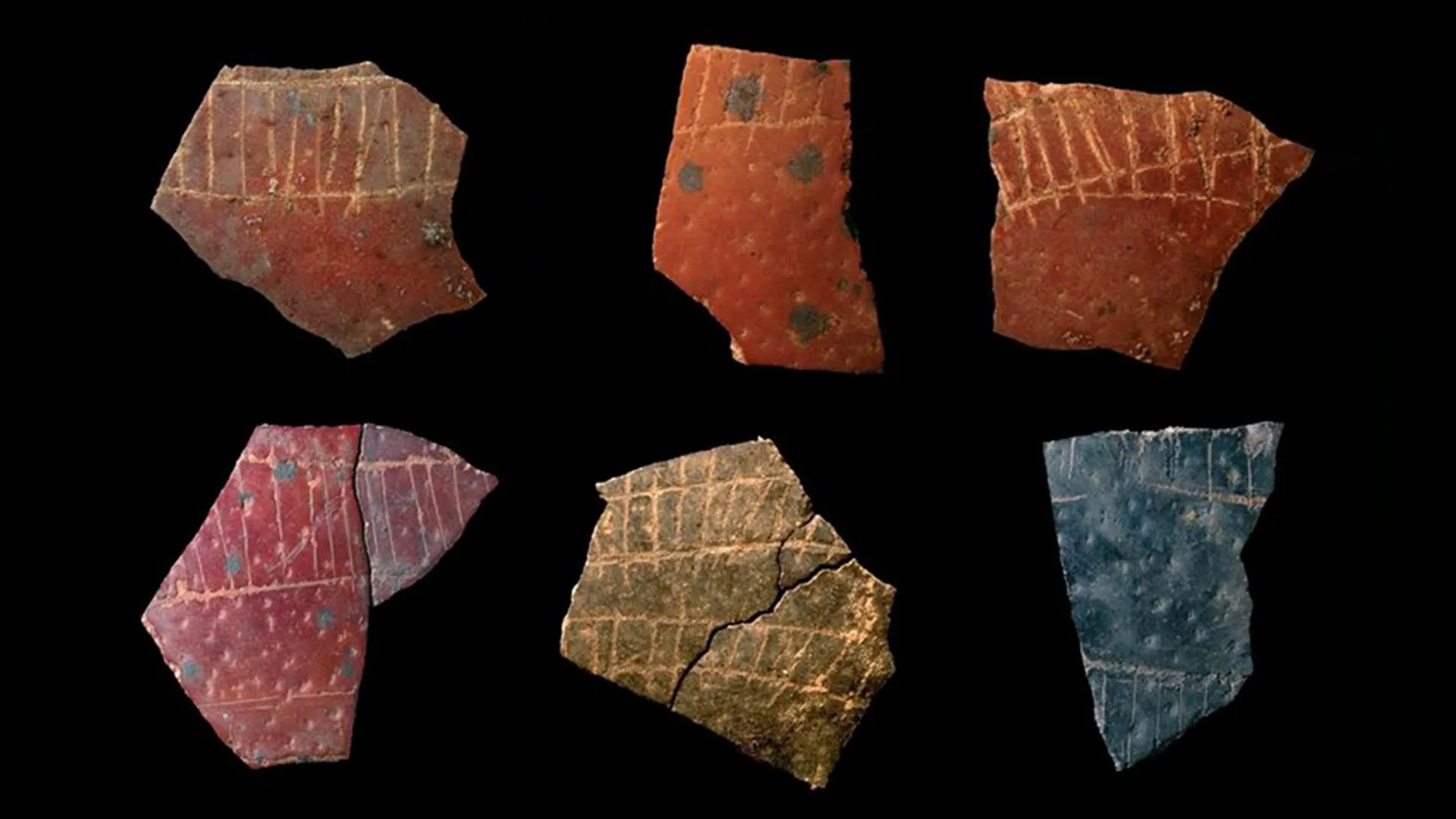 Ancient engraved ostrich eggshell fragment showing geometric patterns carved 60,000 years ago