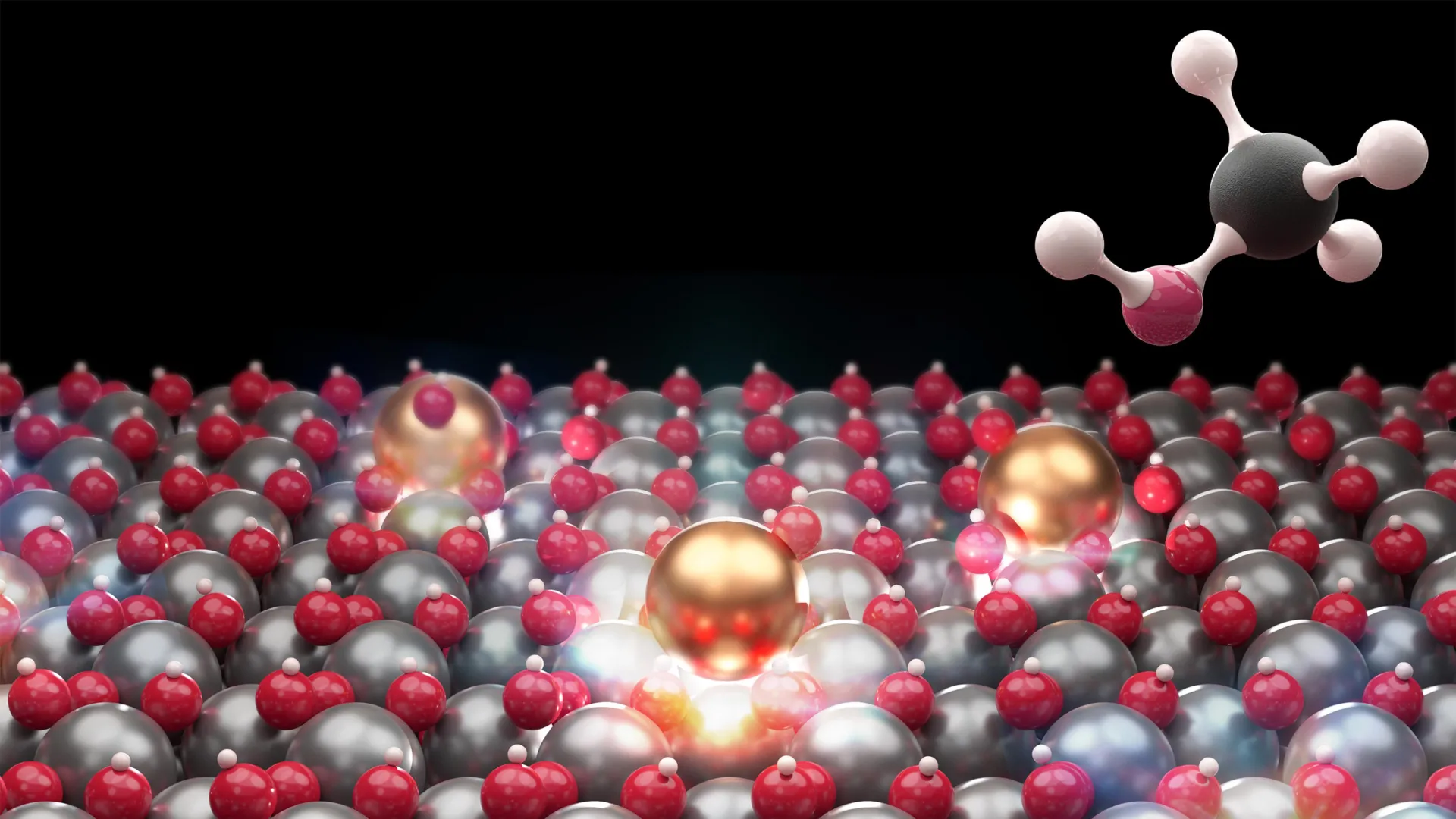 Microscopic visualization showing isolated gold-colored indium atoms on a surface catalyzing methanol synthesis