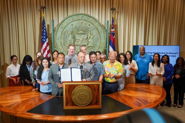 Governor Josh Green signing House Bill 1969 to expand colon cancer screening access in Hawaii