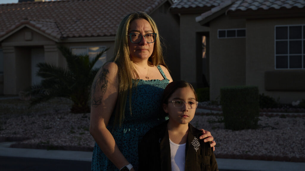 Young boy with supportive mother, representing families fighting for access to medical treatments