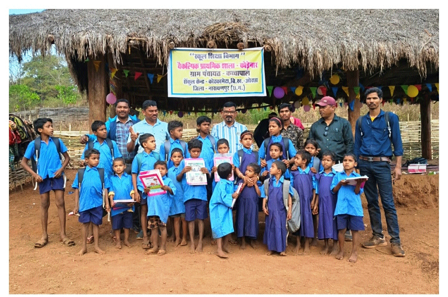 Children in uniforms sitting in classroom in remote Indian forest village school