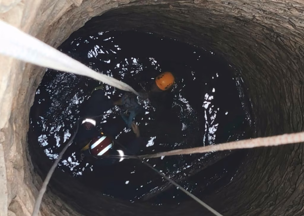 Firefighter Descends 50 Feet to Save Man from Greek Well