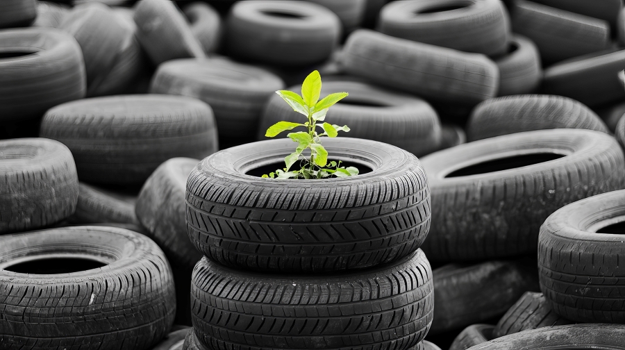 ** Stacks of recycled tires being processed at Spanish recycling facility for environmental reuse