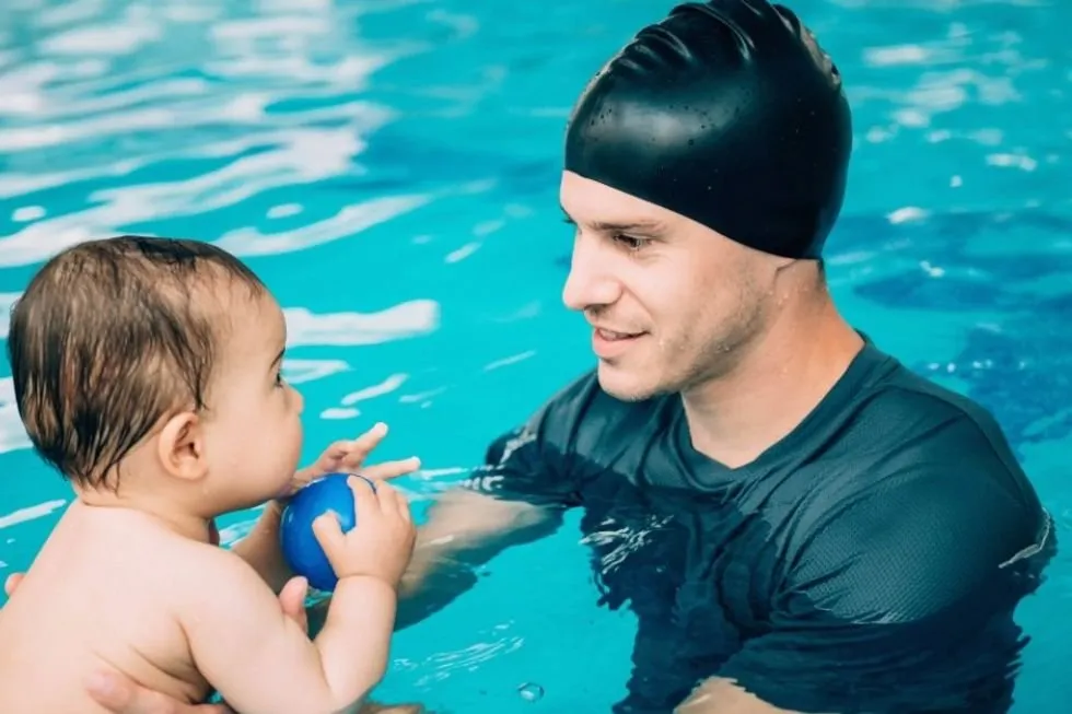 Swim Coach Shows Toddler Why Some Affection Is Just for Family