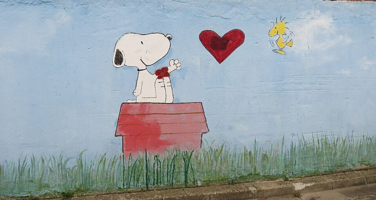 Emma Thompson speaking at festival about wisdom found in Peanuts comic strips