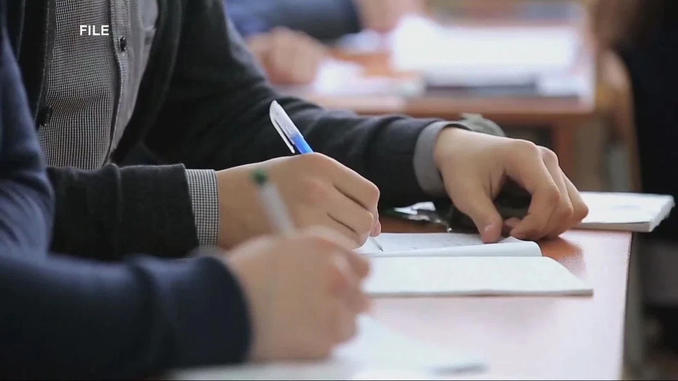 Elementary school students working on math problems at their desks in Alabama classroom