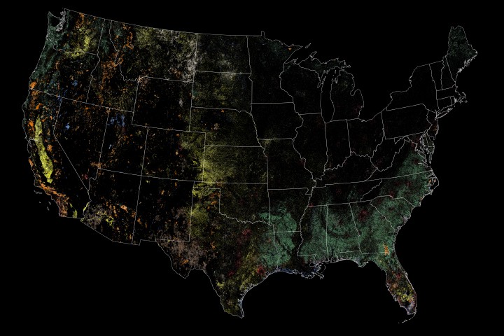 ** Satellite map showing land disturbances across United States from 1988 to 2022 in multiple colors