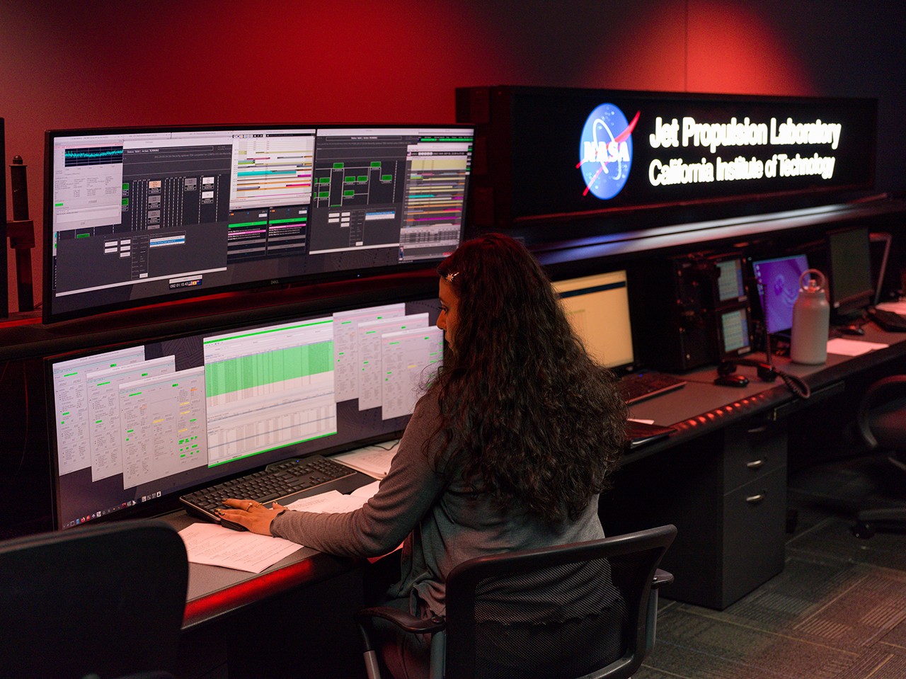 Operations chief Blanca Renteria monitors Artemis II spacecraft data at mission control console