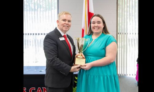 College students receiving awards and scholarships at Gadsden State Community College ceremony