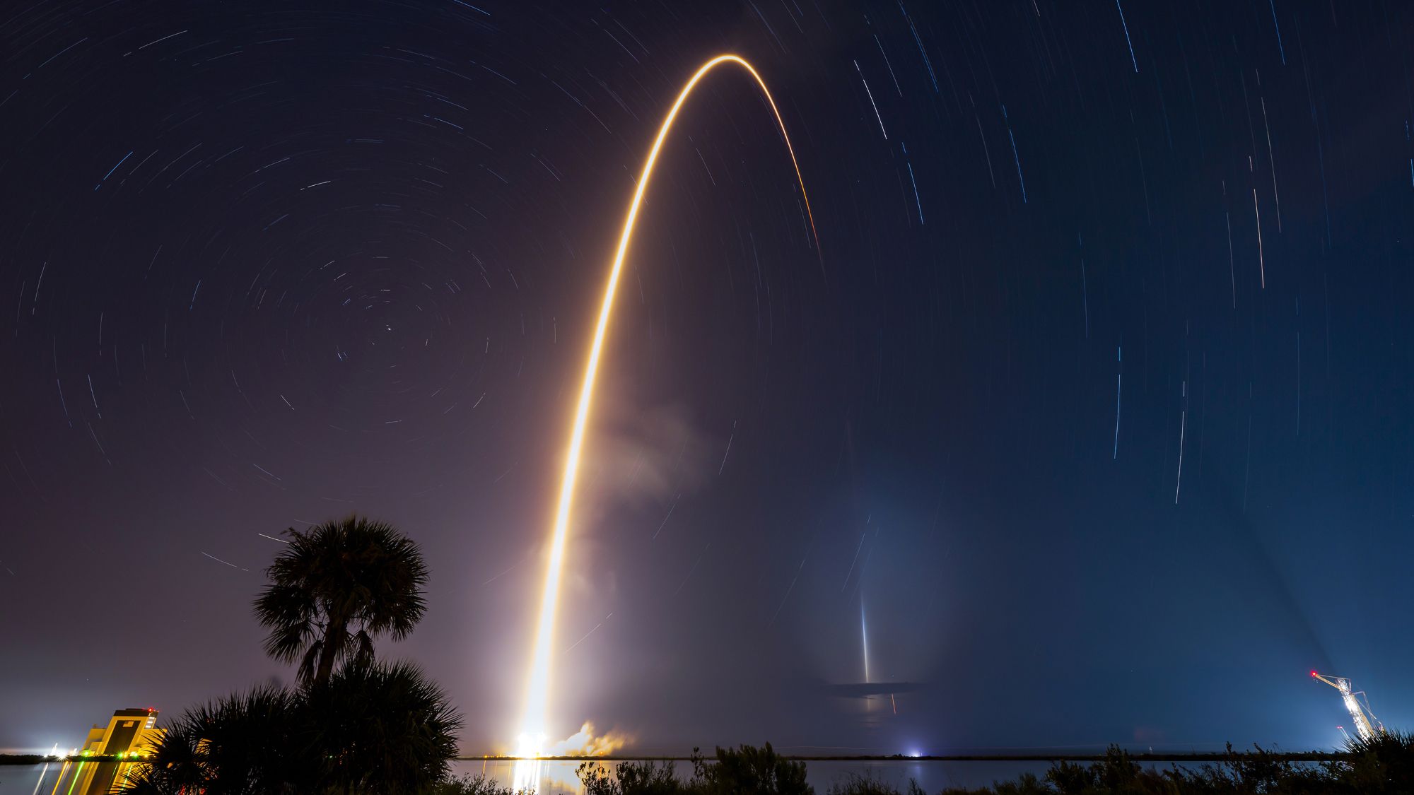 SpaceX Falcon 9 rocket landing on ocean drone ship after completing record 37th mission