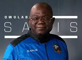 Owolabi Salis in flight suit celebrating historic achievement as first Nigerian in space