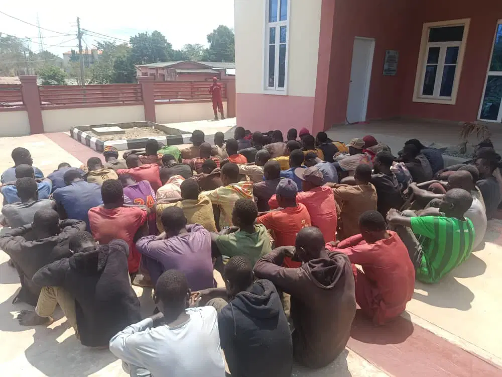 Security personnel standing together in Ondo State Nigeria during coordinated anti-crime operation