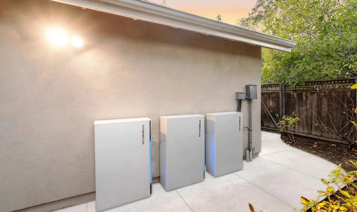 Modern home battery storage system installed on residential wall providing clean backup power