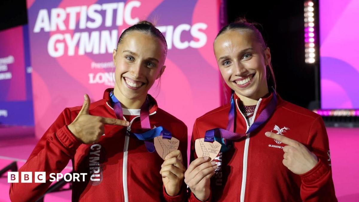 Welsh gymnasts Abigail and Emily Roper celebrating their bronze medals together at Commonwealth Games
