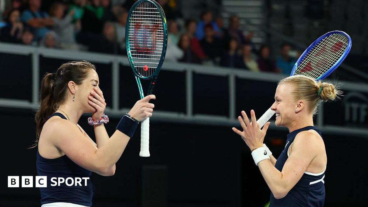 Harriet Dart and Jodie Burrage celebrating together on tennis court after doubles victory