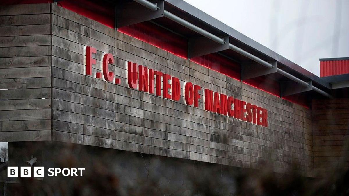 FC United of Manchester's Broadhurst Park stadium with fans in the stands during match day