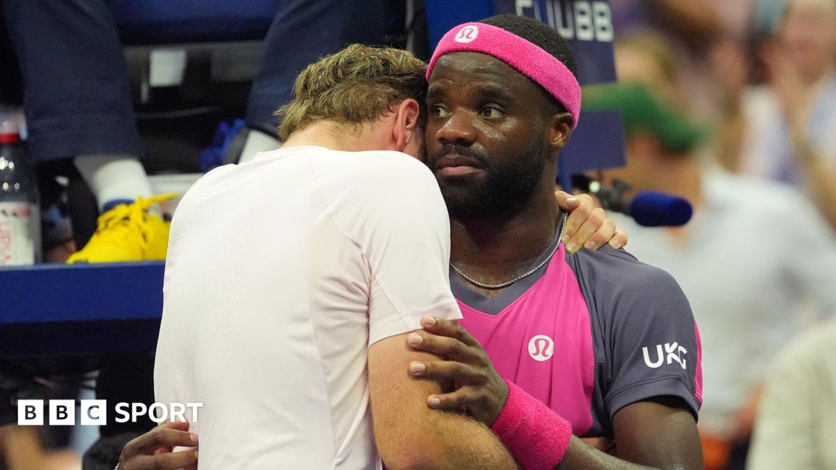 Frances Tiafoe and Alex Michelsen embrace at the net after their dramatic five-set US Open quarterfinal match