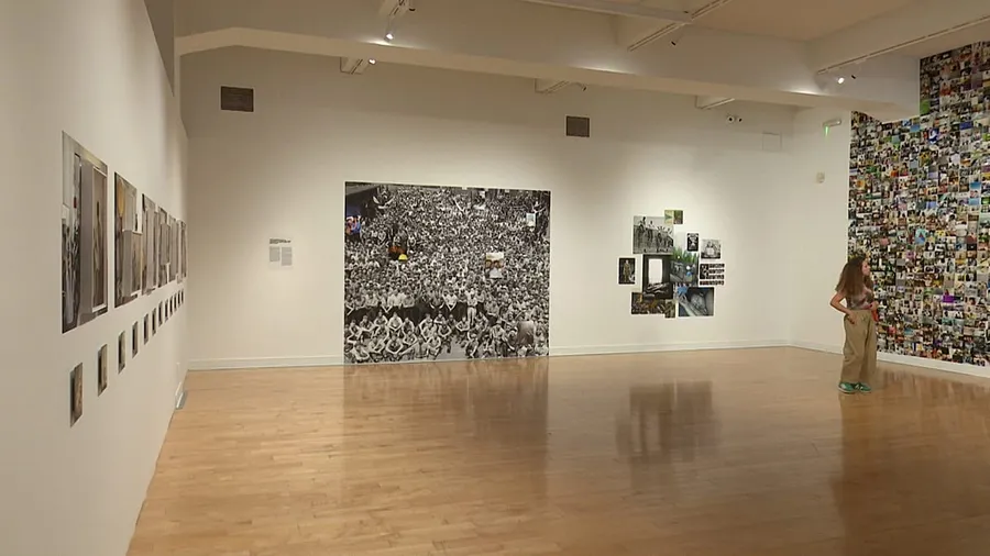 Diverse photographic artworks displayed across spacious white gallery walls at Athens museum exhibition