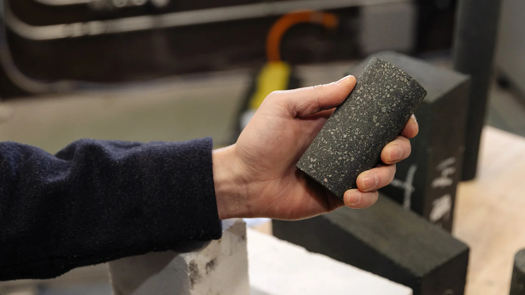 Glowing orange thermal battery bricks storing renewable electricity for industrial heating applications