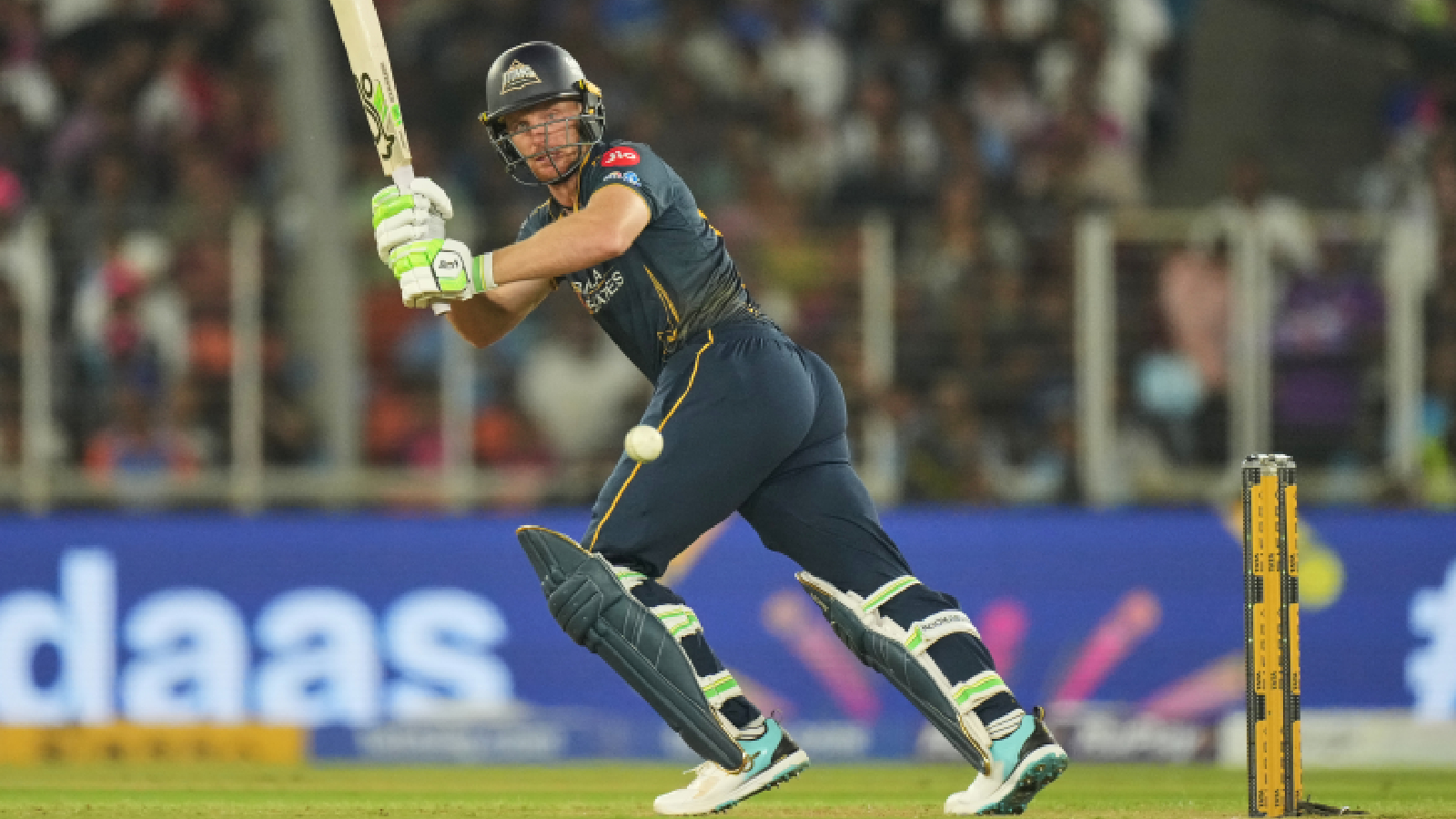 Jos Buttler watching cricket ball intently while batting for Gujarat Titans in IPL match