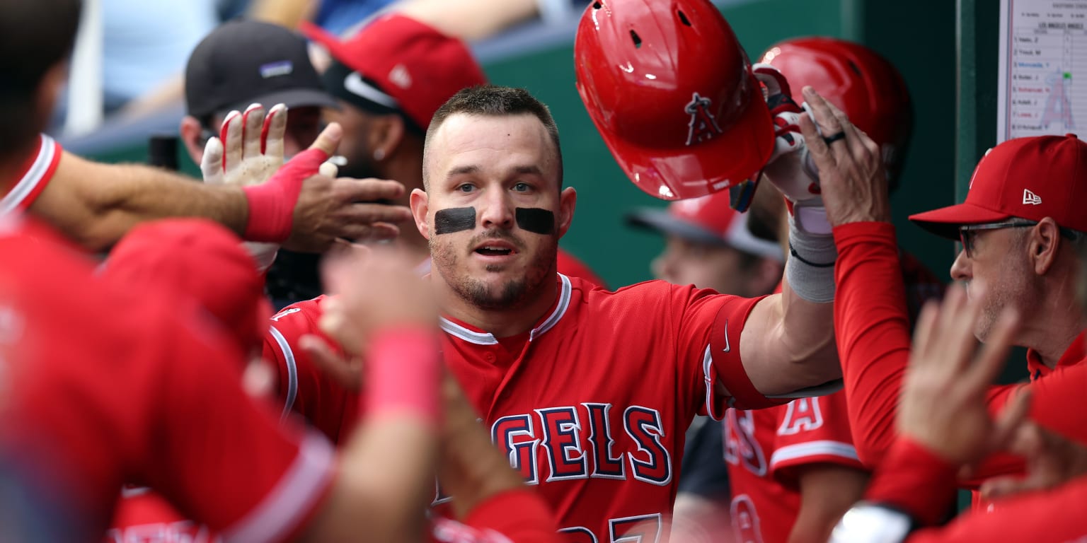 Mike Trout in Angels uniform swinging bat during home run celebration