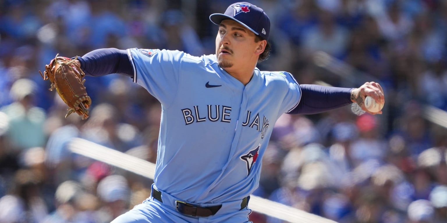 Ricky Tiedemann pitching in his Toronto Blue Jays uniform during his MLB debut game