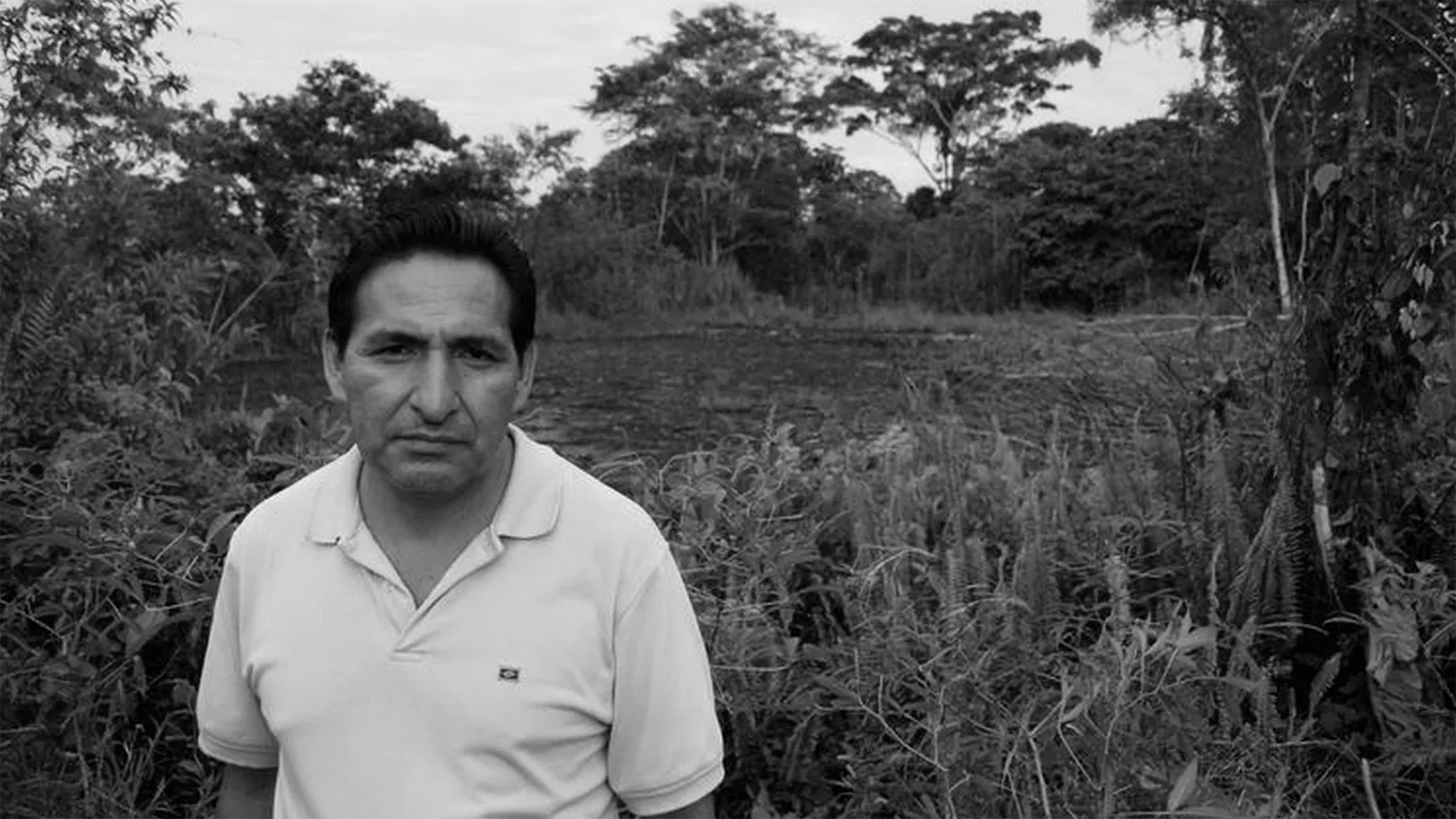 Luis Yanza standing in Ecuador's Amazon rainforest where he organized pollution victims