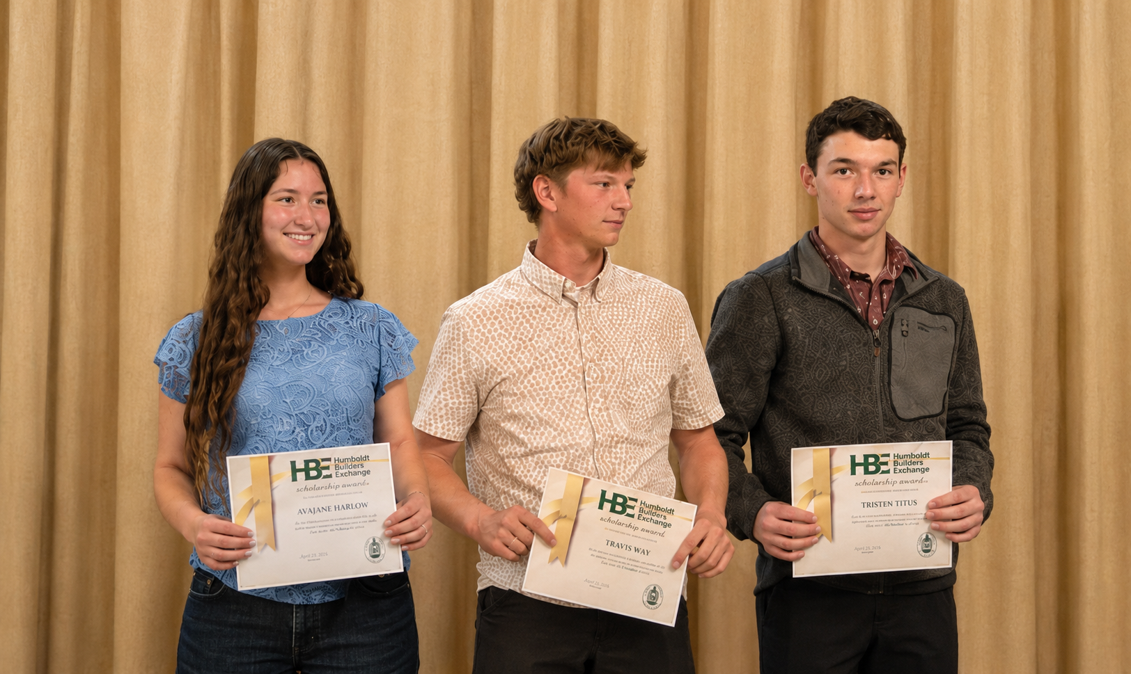 Three scholarship recipients AvaJane Harlow, Travis Way, and Tristan Titus standing together smiling