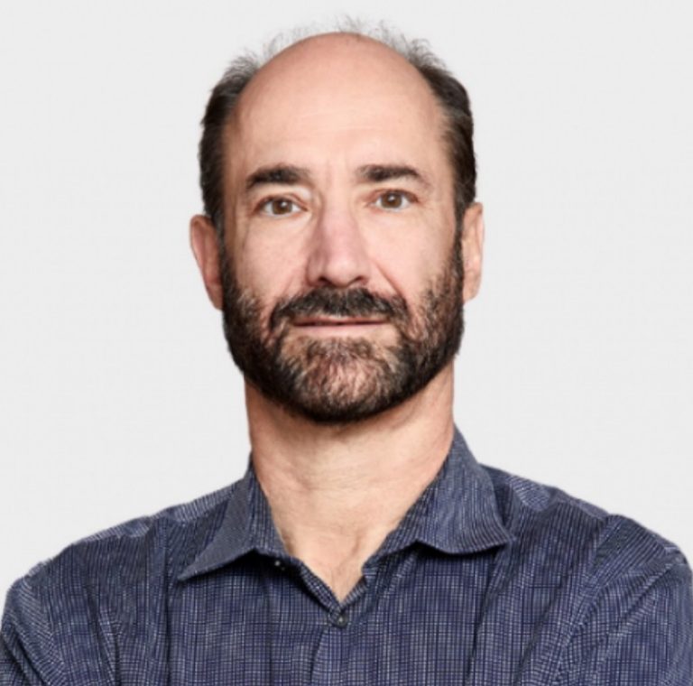 Scientists working with advanced artificial intelligence technology in modern genetics research laboratory at Stanford