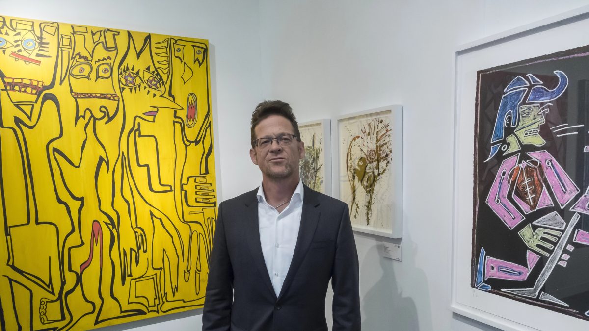 Jason Newsted performing with bass guitar, celebrating his recovery from throat cancer